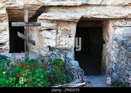 Monastery built in cave . Famous cave monastery in village Tipova from Moldova . House of the monk Stock Photo