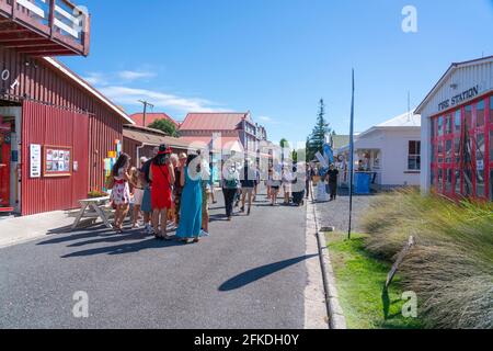 Tauranga New Zealand - April 3 2021; Street scene between historic buildings with people in street. Stock Photo