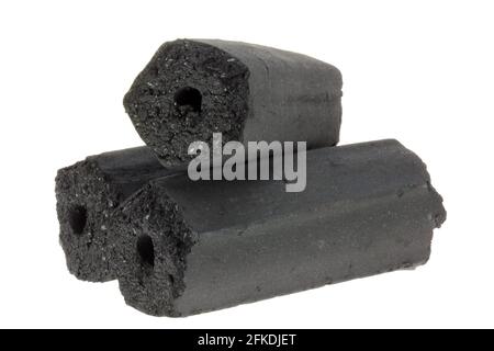 Lumps of Charcoal made of Rice and Coconut Husk, isolated on white Stock Photo