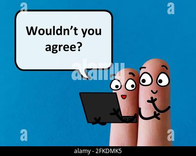 Two fingers are decorated as two person. One of them is asking another if he would agree. Stock Photo