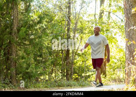 Mature African American man taking a walk outside. Stock Photo