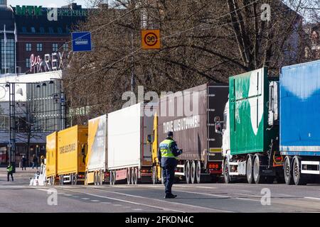 Peat producer´s and transporter´s protest with trucks on Mannerheimintie street in front of the Parliament house in Helsinki Finland Stock Photo