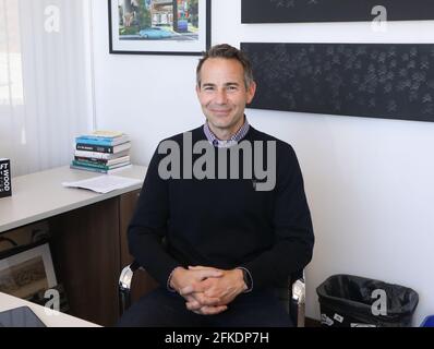 San Diego, California, USA. 29th April, 2021. Professor G. James Daichendt, PhD., Dean of the Colleges, author of six books, art historian and art critic, at his office at Point Loma Nazarene University in San Diego, California.  Credit: Sheri Determan Stock Photo