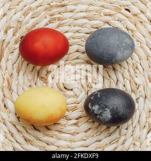 Easter eggs painted with natural home-made organic dye, top view Stock Photo