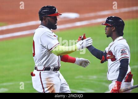 Orlando Arcia of the Atlanta Braves laughs during the Gatorade