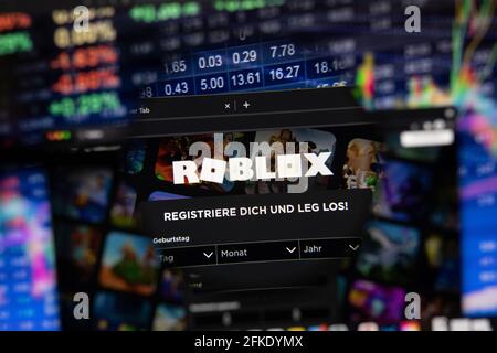 Roblox company logo on a website with blurry stock market developments in  the background, seen on a computer screen through a magnifying glass Stock  Photo - Alamy