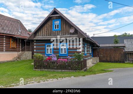 Old wooden houses in village Osturna, Spiska magura region, Slovakia Stock Photo