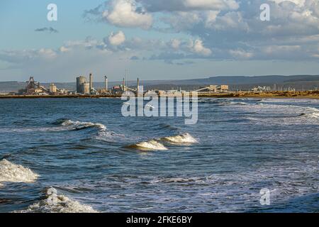 North sea with the Redcar steelworks in distance , England, UK Stock Photo