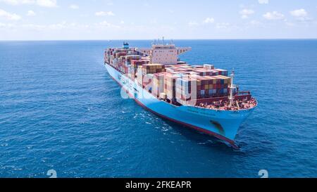 Ultra-large container vessel or ULCV fully loaded with freight Container. Stock Photo