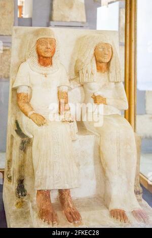 Cairo, Egyptian Museum, statue of Meryre and Iniuy, in limestone. Found in Saqqara by Leiden team. Stock Photo