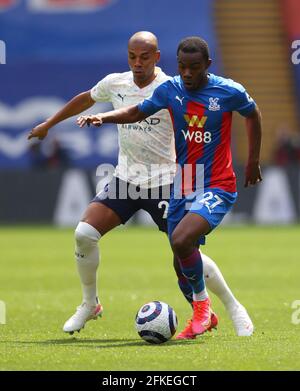 Crystal Palace's Tyrick Mitchell and Manchester City's Fernandinho battle for the ball during the Premier League match at Selhurst Park, London. Issue date: Saturday May 1, 2021. Stock Photo