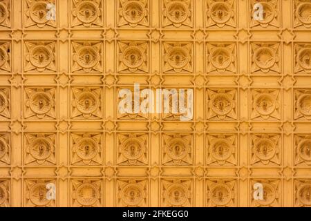 Ceiling of a room with square moldings in line and in the shape of a flower, in pattern Stock Photo