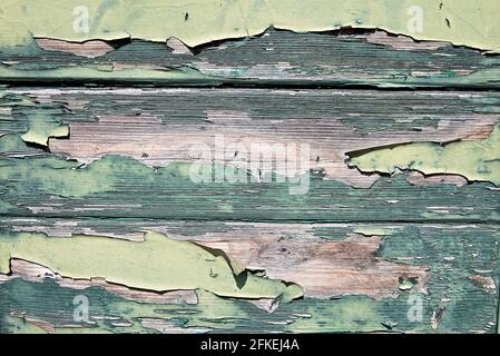 ruined, stripped wooden old door Stock Photo