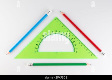 triangular ruler for studying at school isolated on a white background Stock Photo