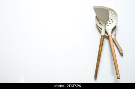 kitchen spatula useful for cooking. White background, place for text Stock Photo