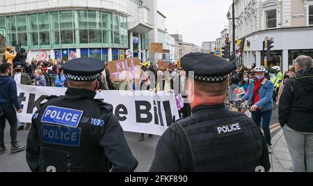Brighton UK 1st May 2021 - Hundreds of Kill the Bill protesters march through Brighton today on International Workers Day as they demonstrate against the government's new Police, Crime, Sentencing and Courts bill. Demonstrations are taking place across the country on what is also known as Labour Day: Credit Simon Dack / Alamy Live News Stock Photo