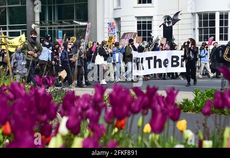 Brighton UK 1st May 2021 - Hundreds of Kill the Bill protesters march through Brighton today on International Workers Day as they demonstrate against the government's new Police, Crime, Sentencing and Courts bill. Demonstrations are taking place across the country on what is also known as Labour Day: Credit Simon Dack / Alamy Live News