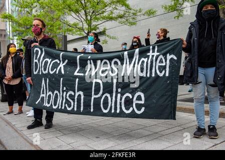 Montreal Quebec Canada May 31 2020: Black lives matter protest in Montreal by police headquarters during the COVID-19 pandemic Stock Photo