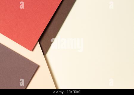 Abstract geometric paper background in earth tones. Beige, yellow, coral, brown colors background Stock Photo