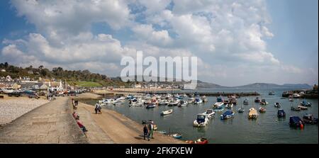Panoramic view of The Cobb and harbour in Lyme Regis, Dorset, UK on 21 April 2021 Stock Photo