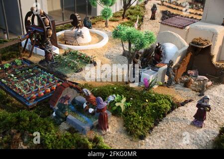 Closeup of figures, buildings and scenes of a presepio, or nativity scene on Portugal, in the Christmas season. Stock Photo