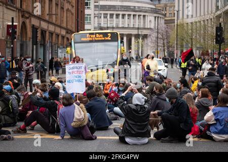 Manchester UK, 1st May 2021, Kill the Bill. Protestors sit down and block traffic on Oxford rd.Protest began in St Peter’s square Manchester. Protesters are rallying against government legislation aimed at curtailing disruptive protests in the UK.  Picture Credit : garyroberts Stock Photo