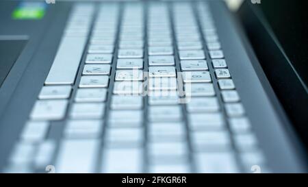 close up shot of laptop keyboard. working Stock Photo