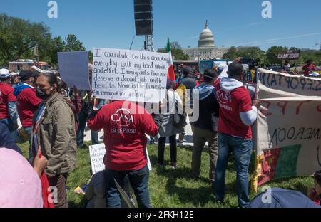 Demonstrators demanding the Biden administration make progress on immigration reform, at a rally on the National Mall on May Day, known as International Workers Day.  More than 25 groups participated in a march which originated at Black Lives Matter Plaza near the White House. May 1, 2021, Washington, DC Stock Photo