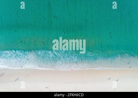 Aerial view of the Turquoise color of Ocean surface with waves washing on the coast of the Andaman ocean Amazing top down nature Landscape seascape vi Stock Photo