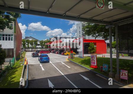 Bird's eye view of Sinopec petrol station architecture in red, Singapore Stock Photo