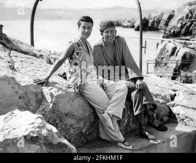 BEATRICE LILLIE (aka Lady Peel) and NOEL COWARD on holiday at the newly fashionable Cap d'Antibes on the French Riviera in August 1928 relaxing before going toAmerica to play the leading parts in the New York production on Coward's revue This Year of Grace Stock Photo