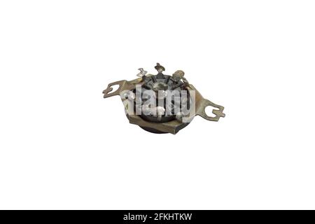 pin socket on chassis-mount, 9-pin connector for vacuum tube, vintage electronic spare part, removed from old appliances. isolated on white background Stock Photo