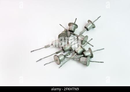 rectifier diodes heap. Vintage electronic components of old circuits Stock Photo