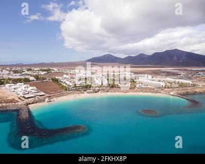 Playa Blanca, Spain; April 28th 2021: Playa Dorada beach in Playa Blanca, Lanzarote, Canary Islands Stock Photo