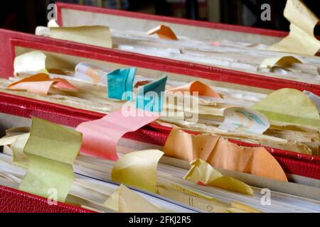 messy file folders and documents, close-up, slective focus, red tape, bureaucracy concept Stock Photo