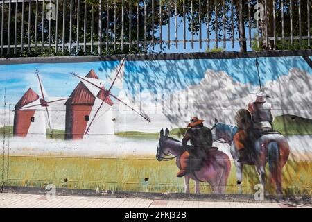 Graffiti of Don Quixote of La Mancha and Sancho Panza in Malaga, Andalusia, Spain. Stock Photo