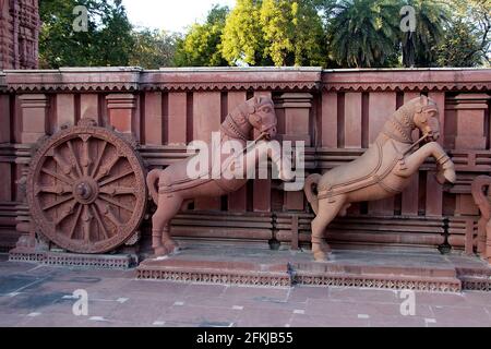 A Close up shot of horse drawn red stone chariot at Birla Sun Temple in Gwalior, Madhya Pradesh, India Stock Photo