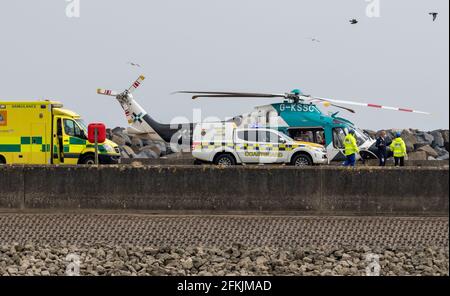 Sovereign Harbour East Sussex, UK. 2nd May, 2021. Coastguard and the Kent Sussex Air Ambulance along with land based crews respond after a diver was brought into harbour following an incident in the waters off of Birling Gap on the South Coast of East Sussex: Credit: Newspics UK South/Alamy Live News Stock Photo