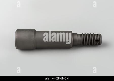 Mounting bolt on a gray background. Car bolt for spare parts. New car parts. Truck Spare Parts Stock Photo