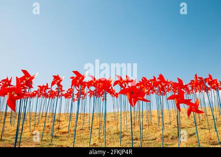 Red pinwheels at Imjingak Pyeonghoa-Nuri park in Paju, Korea Stock Photo