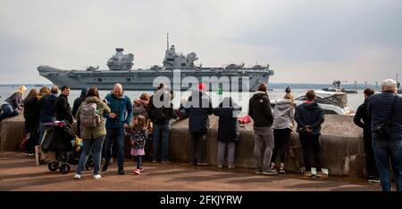 Portsmouth, England, UK. 2021.  Well wishers watch as HMS Queen Elizabeth departs Portsmouth on her maiden deployment to the Pacific Ocean. Stock Photo