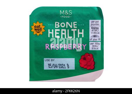 M&S Bone Health raspberry yogurt isolated on white background - low fat fruited yogurts with added vitamin D and live cultures Stock Photo