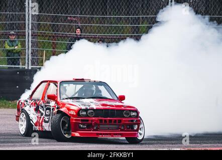 24-04-2021 BMW and tire marks on the asphalt. The car stalled. Drift. Burnout. Editorial photo. Stock Photo