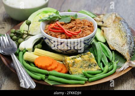 nam phrik pla thu ; vegetables with short mackerel dipping paste , thai traditional salad Stock Photo