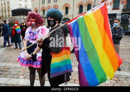 Cracow, Poland. 01st May, 2021. Members of LGBTQ community are seen wearing fancy masks during the demonstration.International Workers' Day, also known as Labour Day or May Day has a long tradition in Poland. Before the fall of communism, propaganda events were held on this day, it is now a day for young adults with left-wing views to express their reservations about the labour market and the lack of social justice it entails, as forcing workers into self-employment and abuses of labour rights are common practices in Poland. Credit: SOPA Images Limited/Alamy Live News Stock Photo