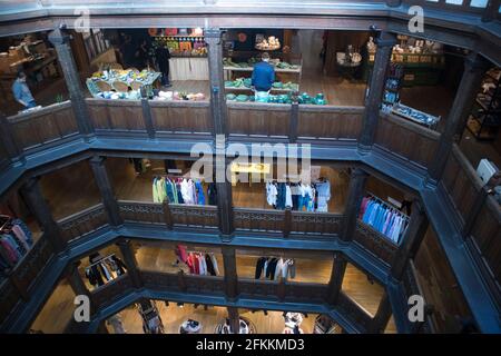 LONDON, UK - FEBRUARY 22, 2020: Interior view of Liberty shopping mall, one of the oldest department stores in London. Stock Photo