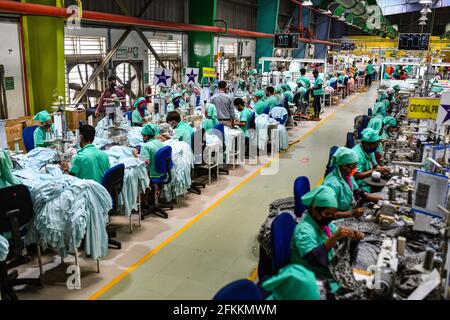 Dhaka, Dhaka, Bangladesh. 2nd May, 2021. Garment workers work in a sewing section of the Fakhruddin Textile Mills Limited in Gazipur, Bangladesh, on May 2, 2021. Credit: Zabed Hasnain Chowdhury/ZUMA Wire/Alamy Live News Stock Photo