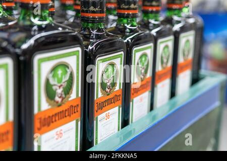 Green bottle of Jagermeister, bottom view, tasty popular German strong  liqueur infused with herbs. alcoholic drink which includes 56 botanical  ingredi Stock Photo - Alamy