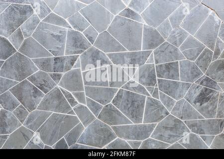 Black brick wall background inside of the room. Stock Photo