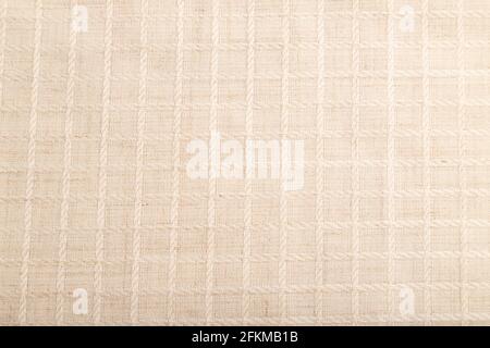 Fragment of smooth white linen tissue. Top view, flat lay, natural textile background and texture. Stock Photo